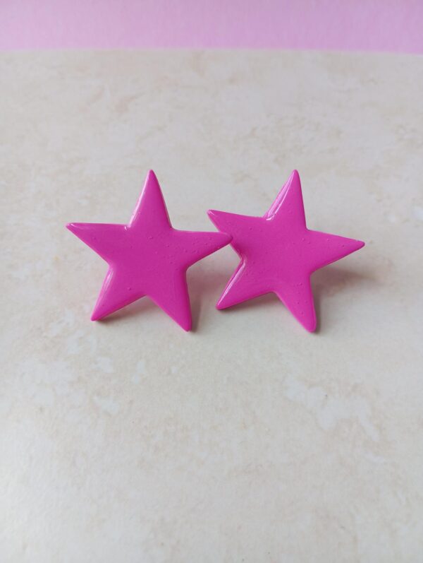 Caravanas Estrella Fucsia